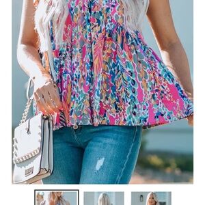 A Classy Chic Boutique Vibrant Multicolor Blouse in size medium hot pink
